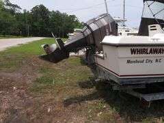1992  KEY WEST 20 foot with CUDDY CABIN, with electronics, portable toilet, accessories, with 175 HP MARINER Outboard Motor, Hull ID  KWEWA189E292, with EZ LOADER Galvanized Trailer