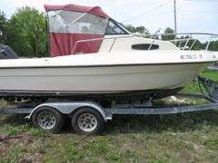 1992  KEY WEST 20 foot with CUDDY CABIN, with electronics, portable toilet, accessories, with 175 HP MARINER Outboard Motor, Hull ID  KWEWA189E292, with EZ LOADER Galvanized Trailer