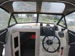 1992  KEY WEST 20 foot with CUDDY CABIN, with electronics, portable toilet, accessories, with 175 HP MARINER Outboard Motor, Hull ID  KWEWA189E292, with EZ LOADER Galvanized Trailer