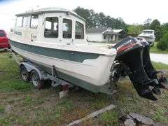 1999  C - DORY  CRUISER, 22 foot fiberglass with Cabin, with twin MERCURY 30 hp FOUR STROKE OUTBOARDS, boat in very good condition, one outboard runs as should, other outboard unknow, Hull ID DOR22812G899 , with Boat Trailer