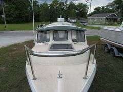 1999  C - DORY  CRUISER, 22 foot fiberglass with Cabin, with twin MERCURY 30 hp FOUR STROKE OUTBOARDS, boat in very good condition, one outboard runs as should, other outboard unknow, Hull ID DOR22812G899 , with Boat Trailer
