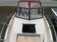 1992  KEY WEST 20 foot with CUDDY CABIN, with electronics, portable toilet, accessories, with 175 HP MARINER Outboard Motor, Hull ID  KWEWA189E292, with EZ LOADER Galvanized Trailer