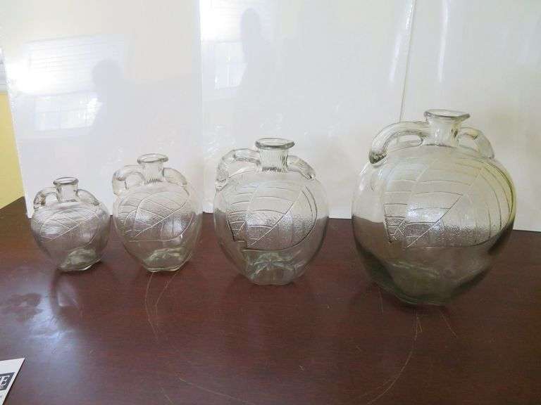Four nice decorative glass jugs image