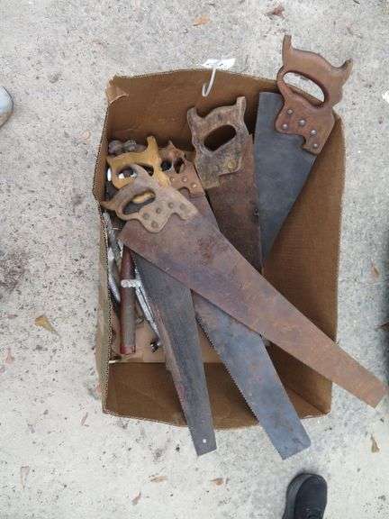 Seven hand saws, assorted tools image