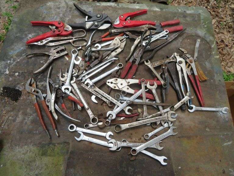 Assortment of wrenches and pliers image