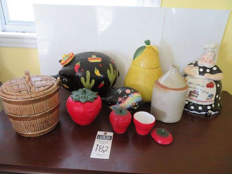 Three cookie jars, one jug, two piggy banks, three candy jars with lids image