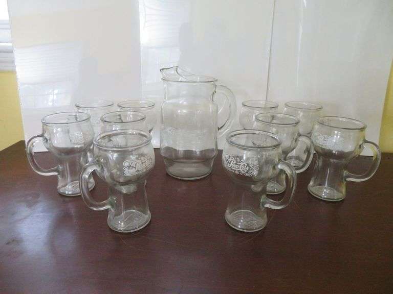 Ten Vintage PEPSI collector drinking glasses, one matching pitcher image