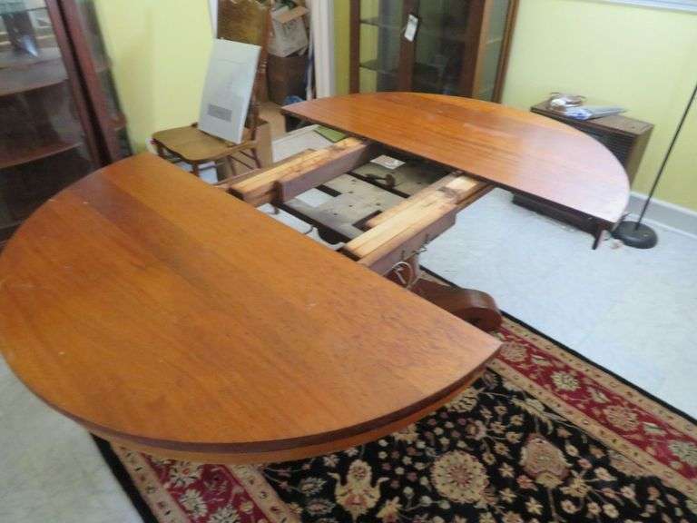 55" Round Pedestal that opens for leaf insert, believed to be mahogany, no leaves with table image
