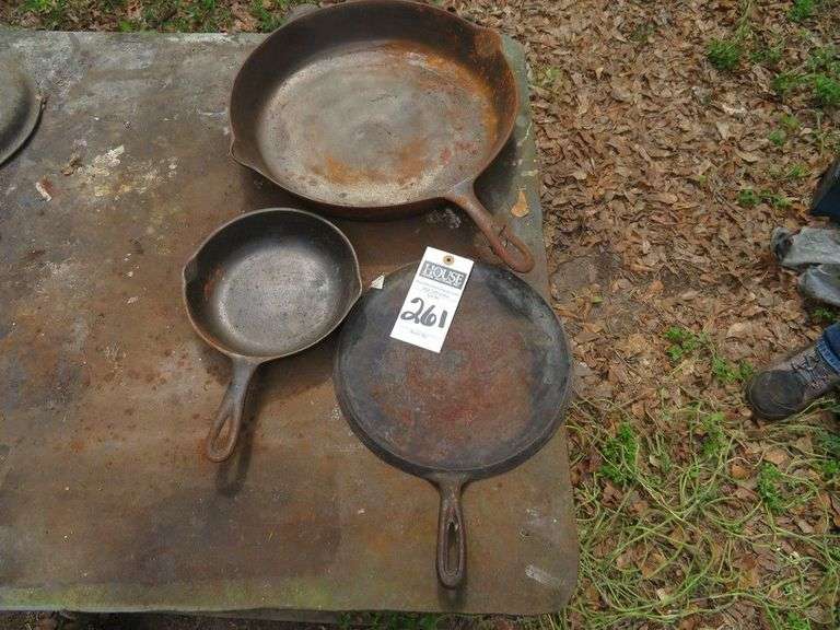 (1)Large 14" cast iron frying pan, (1) 5" cast iron frying pan, (1) 9" cast iron flat skillet image