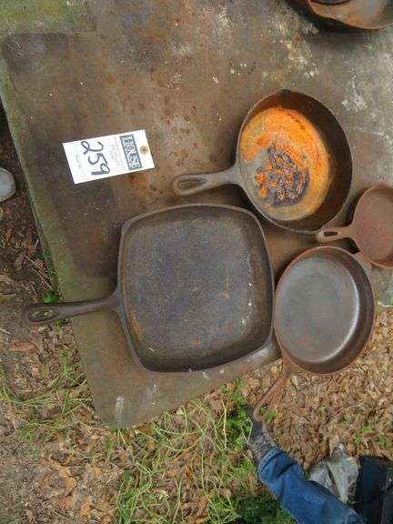 4 Cast Iron Frying Pans: 1 10" square, 3 round: 6/5", 9" and 9.5" image