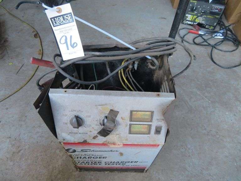 SCHUMACHER 225 AMP STARTER-CHARGER, exterior damaged but seems to work, not guaranteed image