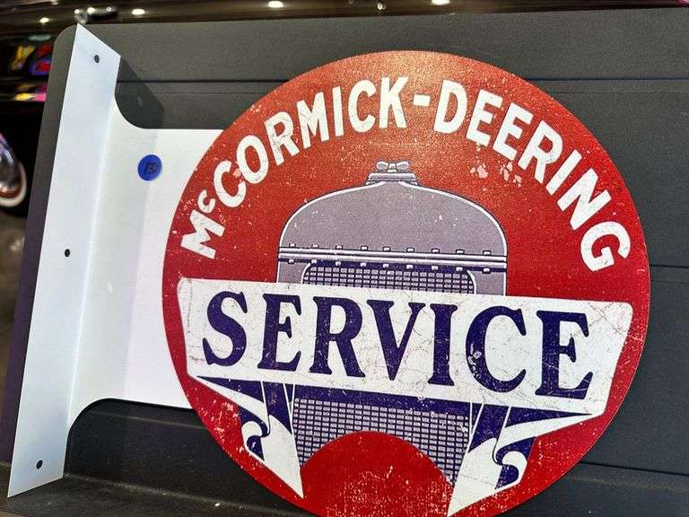 Metal double sided flange sign - McCormick Deering image