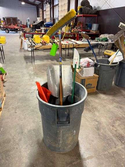 Trash Bin with Brooms, Shovel and Flag image
