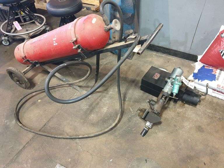 (1) Fire Extinguisher and (2) Hydraulic Pumps image