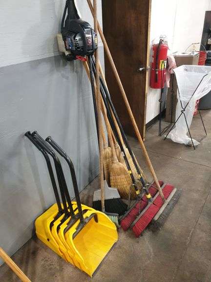 Lot of Brooms with dust pans image