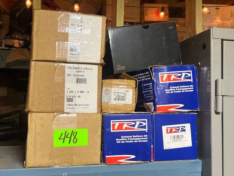 Lot - Fanfold Acrylic Labels, International R520 End Bushing, TRP Exhaust Bellows Kit, and Harley Davidson 2-Bank Battery Charger image