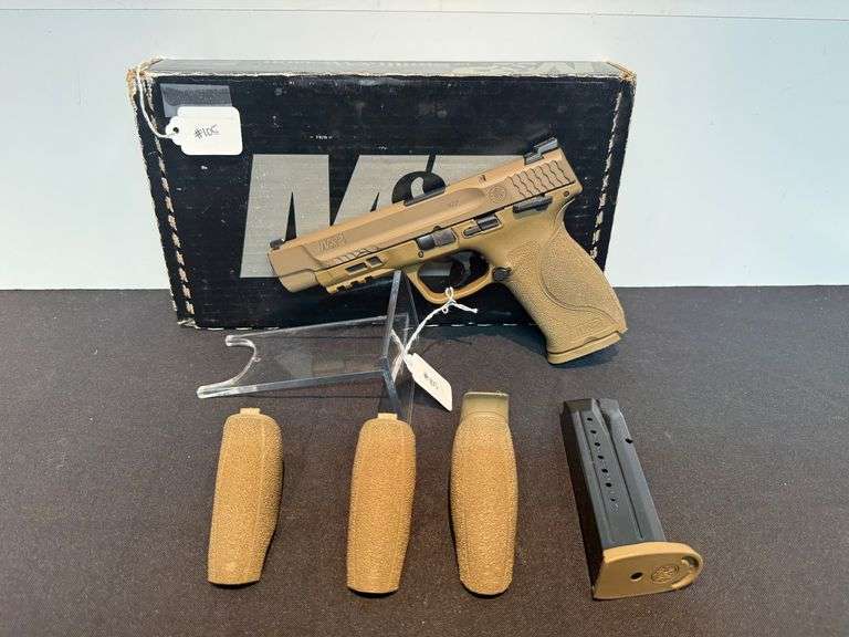 Smith & Wesson M&P 4 - 9mm Pistol with Additional Grips and Magazine in Box image