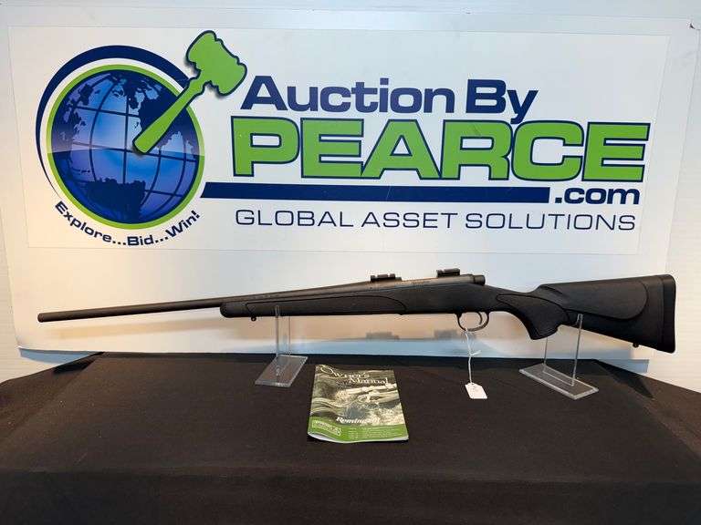 Remington 700 .223 Rifle with Adjustable Trigger and Leupold Scope Base image