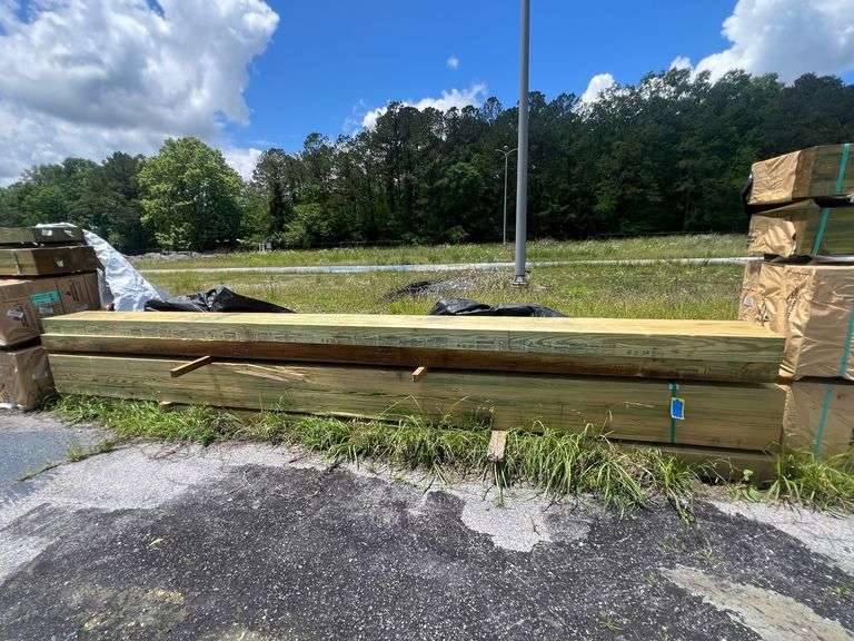 Lot - (4) GluLam Treated Lumber - 5-1/4" x 14" x 18' image