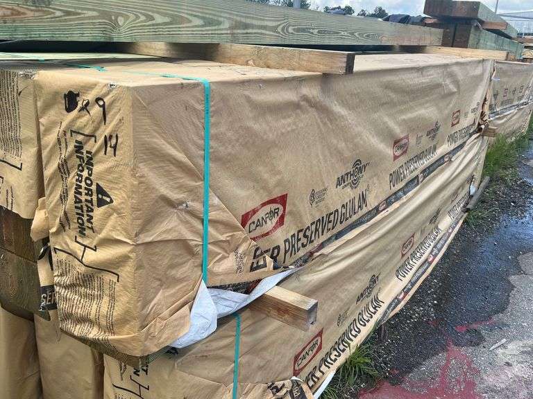 Lot - (4) GluLam Treated Lumber - 5-1/4" x 9-1/4" x 14' image