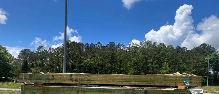 Lot - (4) GluLam Treated Lumber - 5-1/4" x 9-1/4" x 14' image