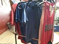 Clothes hanging on rack - metal rack included