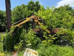 Massey Ferguson 390T Tractor with Alamo Side Arm BA60 Cutter