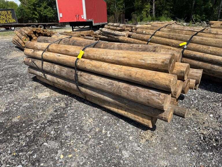 Untreated Wood Posts - Assorted Diameters and Lengths between 9ft and 10ft Long image