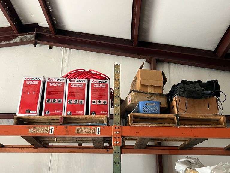 Spring driven air hose and (2) pallets of misc (Note on top shelf and buyer must remove) image