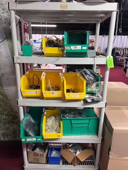 Shelf with all contents: Bins of wire, misc image