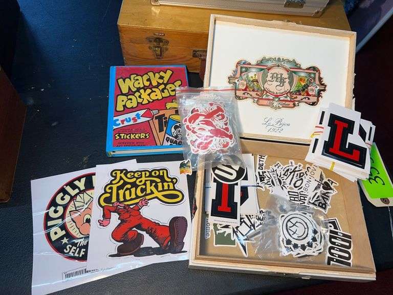 Cigar box with stickers inside/Wacky sticker book image
