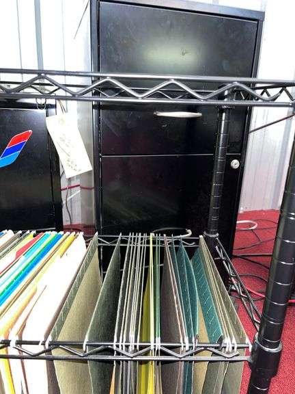 Table with all contents: Office Equipment, (2) Printers, (2) label printers/Monitor/Keyboard