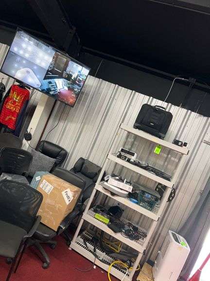 Samsung 63" TV (Works), Plastic shelf with all contents: Samsonite luggage, drone, keyboard image