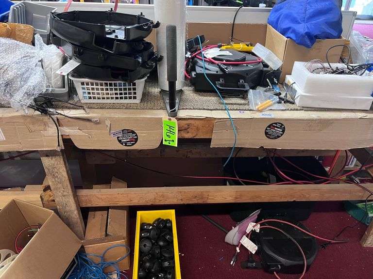 Long wood work table: Cables/wire/reels/contents above & below