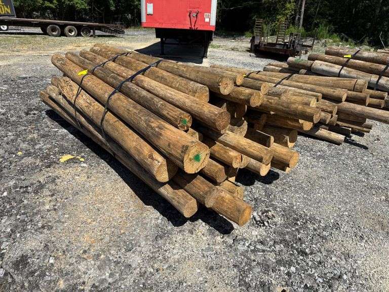 Untreated Wood Posts - Assorted Diameters and Lengths between 7ft and 10ft Long image