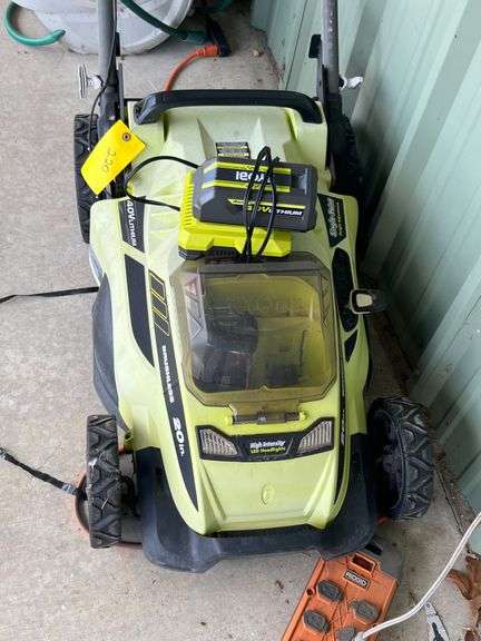 Ryobi Battery Powered lawn Mower with batteries and charger