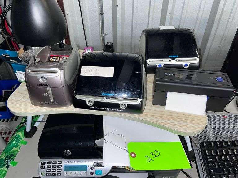 Table with all contents: Office Equipment, (2) Printers, (2) label printers/Monitor/Keyboard