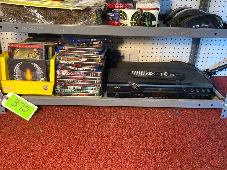 Various DVDs and Player image