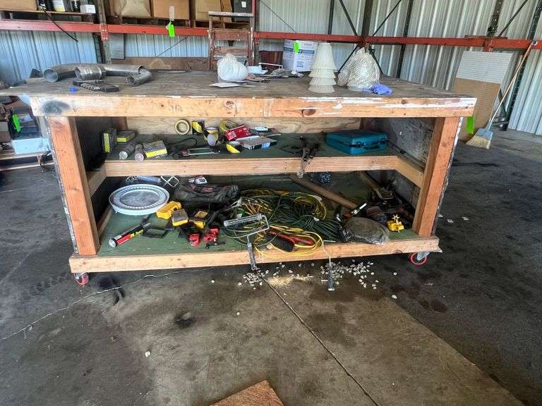 Wooden rolling work table WITH contents image