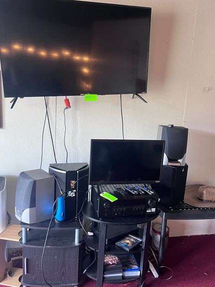 (3) tables with electronic Equipment: (2) TV, receiver, (4) speakers image