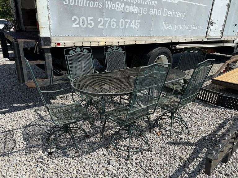 Wrought Iron 7-Piece Patio Set - Oval Table with (6) Swivel Rocker Arm Chairs image