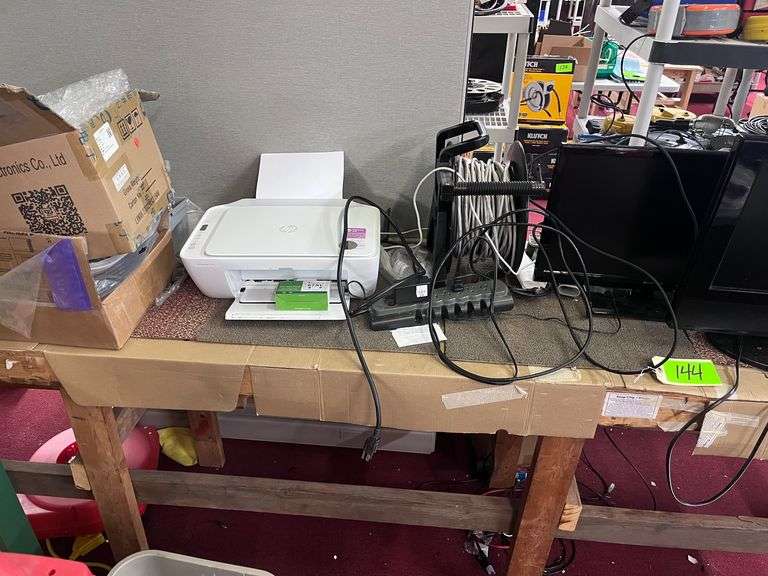 Wood work table: Printer, (2) monitors/Wire/metal plates image