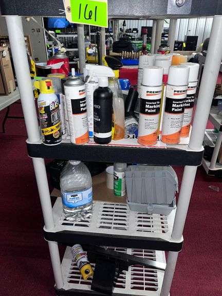 Shelf with all contents:  Marking paint, bins