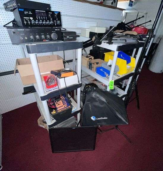 (3) Shelves with contents: Electronic equipment, photography equipment, camera, mic, light stands/reels image