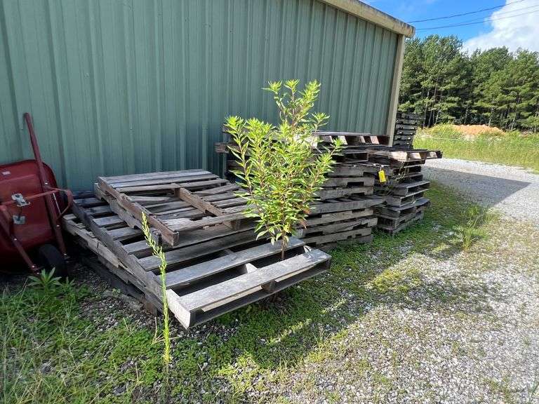 All Outdoor pallets behind building