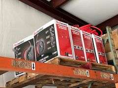 Spring driven air hose and (2) pallets of misc (Note on top shelf and buyer must remove)