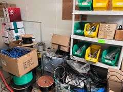 Large lot of wire, shelf with all contents, white board