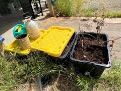 Bins with dirt/top soil/bags of mulch