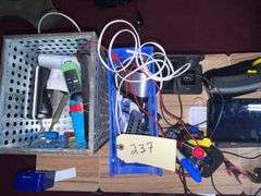 Rolling work table with charging cords/clock infrared Thermometer