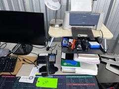 Table with all contents: Office Equipment, (2) Printers, (2) label printers/Monitor/Keyboard